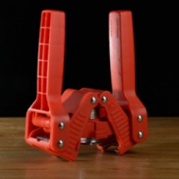 RED DOUBLE LEVER HAND CAPPER
